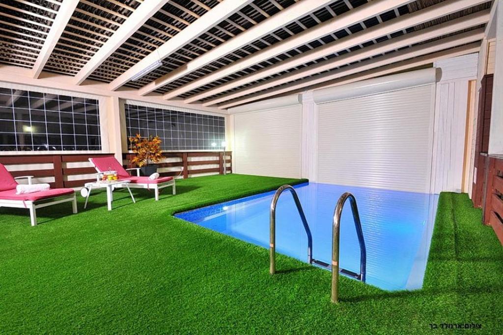 יערה Between Sunrise And Sunset Suites מראה חיצוני תמונה